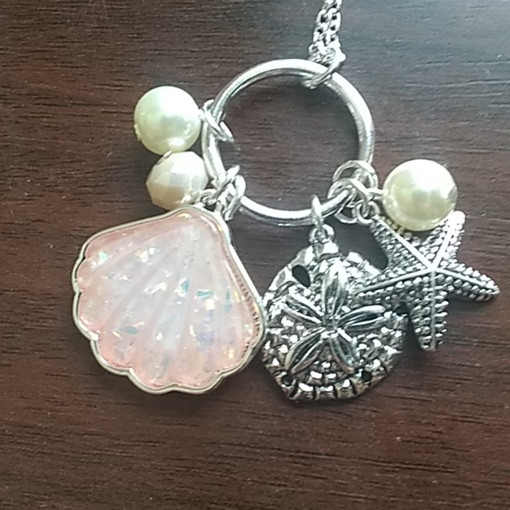 Silver chained necklace with sea charms